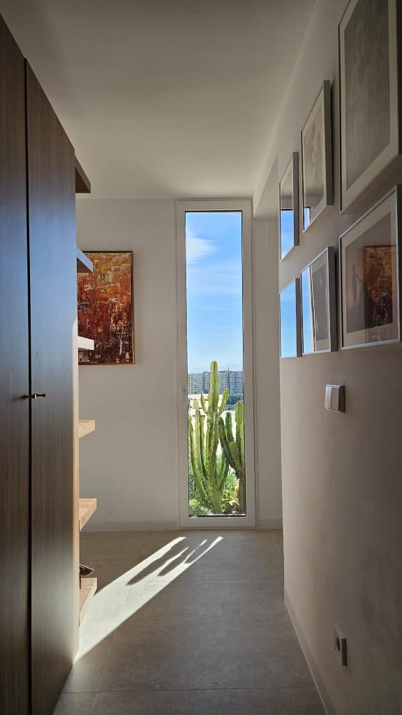 Tierra y fuego in a hallway with garden light